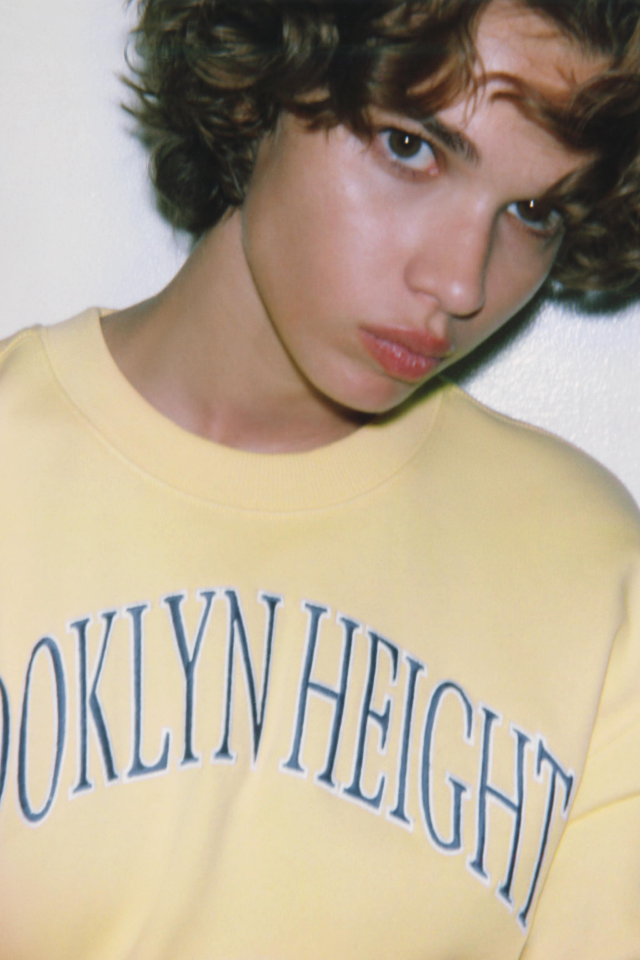 SWEAT EN MOLLETON À INSCRIPTION BRODÉE